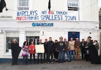 Protest banner hung from bank