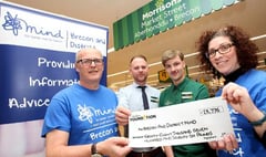 Cheque for £28,776 helps wellbeing service