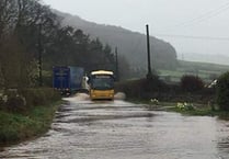 Road floods after brook bursts its banks