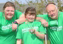 Nine-year-old climbs Pen y Fan three times in one day for nan