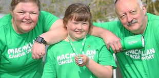Nine-year-old climbs Pen y Fan three times in one day for nan