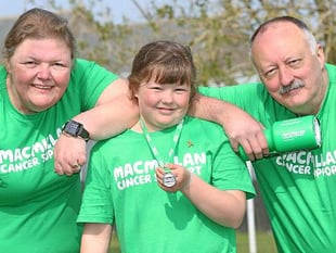 Nine-year-old climbs Pen y Fan three times in one day for nan