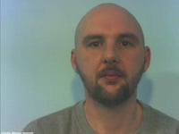 Police search for man wanted in connection with burglaries