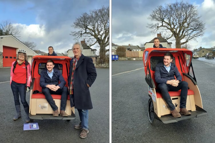 Left to right: The Arches’ Pippa Boss, James Evans MS and Cllr Kelvyn Curry. Behind is volunteer pilot Alan Samuel.