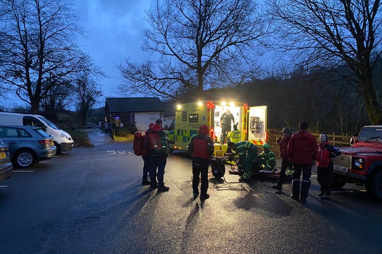 The ambulance and HART team waiting to assist the walker in the carpark