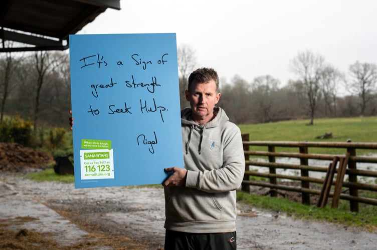Nigel Owens stands for a portrait at his farm in Pontyberem.