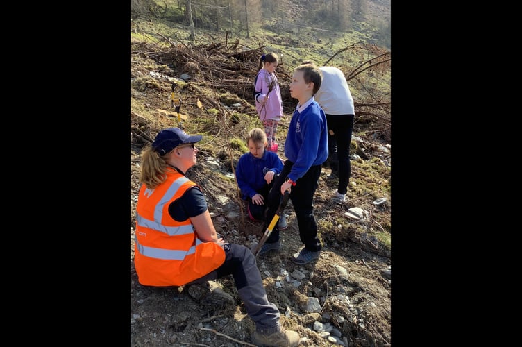 Elan Valley Ranger Beth Rees with school children