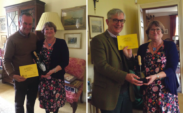 Left is The Carrows, of Tyn y Cwm, receiving their 10-year award and right is Lord Milford, of Llanstephen House and Chris Carrow.