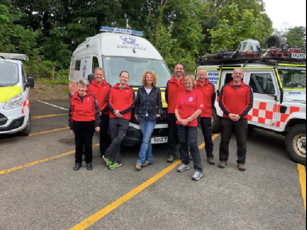 Brecon Mountain Rescue Team volunteers with the team’s ambassador Kate Humble