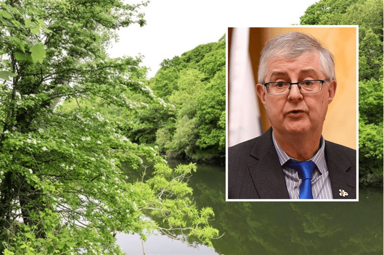 First Minister Mark Drakeford and a river