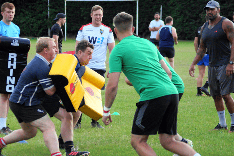 Dale McIntosh gets stuck into a training session