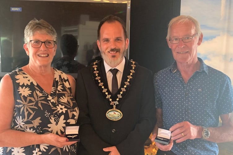 Cllr Gareth Ratcliffe presenting the Silver Kite Awards to Karen and Danny Sherwood.