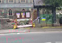 Woman in hospital after collision with Brecon churchyard 