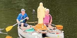 Virgin Mary sculpture floats down Wye in pollution demo