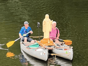 Virgin Mary sculpture floats down Wye in pollution demo