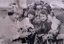 Queen showered with flowers after visit to Brecon Cathedral