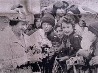 Queen showered with flowers after visit to Brecon Cathedral