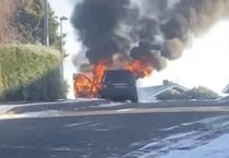 Firefighters extinguish Powys car fire