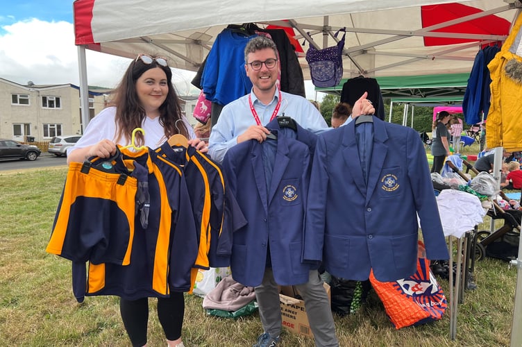 Cllr Matthew Dorrance and Cllr Michaela Davies with the Swop Shop at Uplands Field.