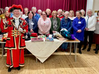 Llandrindod town crier rings a bell with Howey WI!