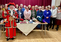 Llandrindod town crier rings a bell with Howey WI!