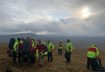 Injured walker stretchered off hillside near Corn Du