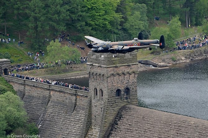 A Lancaster bomber aircraft from the Battle of Britain Memorial Flight (BBMF) soars over the Derwent Valley Dam in Derbyshire. The famous 'Dambusters' of the RAF's 617 Squadron trained in this valley during the Second World War for their mission.

It is 65 years since the Dambusters flew their daring raid over wartime Germany.
  
<i>This image is available for non-commercial, high resolution download at www.defenceimages.mod.uk subject to terms and conditions. Search for image number <b>45147543.jpg</b></i>
----------------------------------------------------------------------------
Photographer: Sgt Graham Spark
Image 45147543.jpg from www.defenceimages.mod.uk
