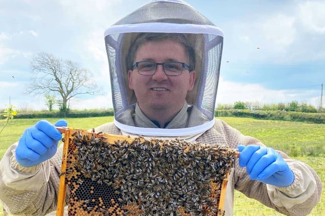 Beekeeper Adam Jones