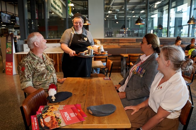 EDITORIAL USE ONLY Military personnel and veterans dressed in armed forces uniforms or with a valid form of identification, medal or badge will be entitled to receive fifty percent off hot meals, hot drinks and cakes at Morrisons cafs nationwide this Saturday, which is Armed Forces Day. Issue date: Thursday June 22, 2023. PA Photo. The half-price hot meals menu includes favourites such as a roast beef or half roast chicken dinner for £3.75, fish and chips for £3.50 or bangers and mash for just £2.50, as well as a selection of cakes. Photo credit should read: Owen Humphreys/PA Wire 