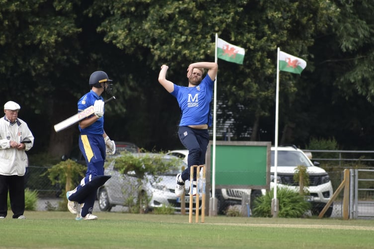 Brecon Cricket Club - James Mitchell getting his full weight behind his bowling