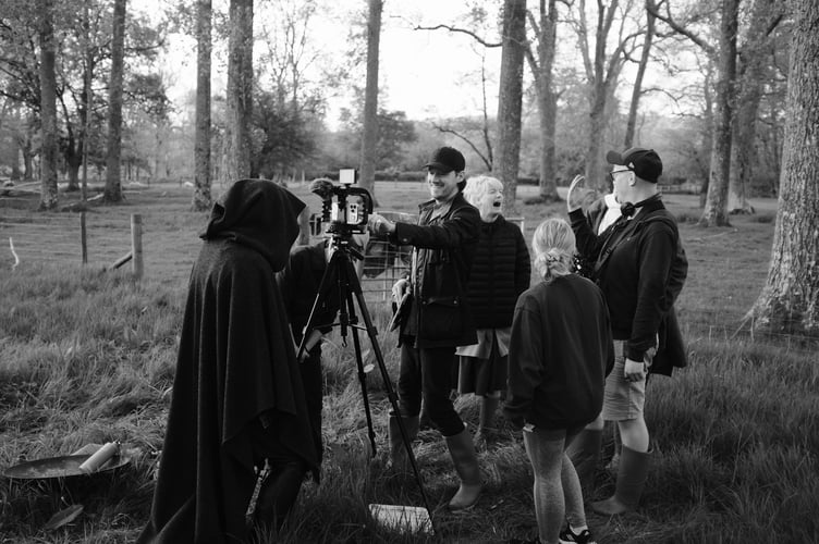 Film crew with druid