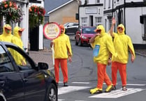 Crickhowell goes 'quackers' as human ducks promote upcoming duck race