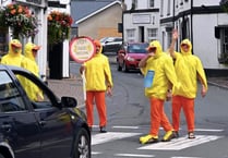 Crickhowell goes 'quackers' as human ducks promote upcoming duck race