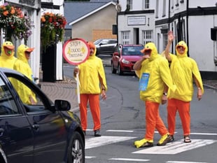 Crickhowell goes 'quackers' as human ducks promote upcoming duck race