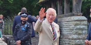 Why were King Charles and Queen Camilla at Brecon Cathedral? 