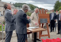 Plaque 'unveils itself' at Brecon theatre for King and Queen's visit