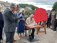 Why did King Charles and Queen Camilla visit Theatr Brycheiniog? 