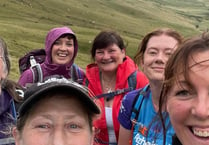 Builth veterinary team raises thousands for charity with 26-mile trek