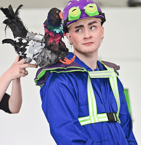 One of three superhero frog plumbers with a bird puppet.jpg