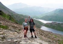 Daughter climbs Snowdon in father's memory for charity