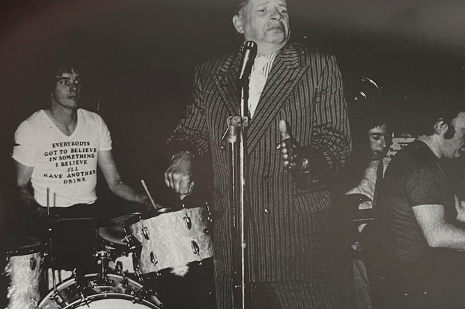 John Gibbon play the drums with singer George Melly, John Lambrick on bass, and Tom Williams on piano.