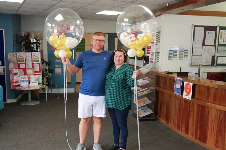 John Evans and Samantha Ford were very happy with their Business and Law results.