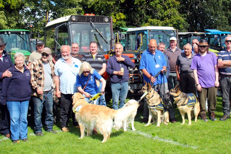 Some of the tractor drivers meeting the guide dogs