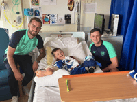 Cardiff footballer visits Brecon Boy who waited 9 hours for ambulance