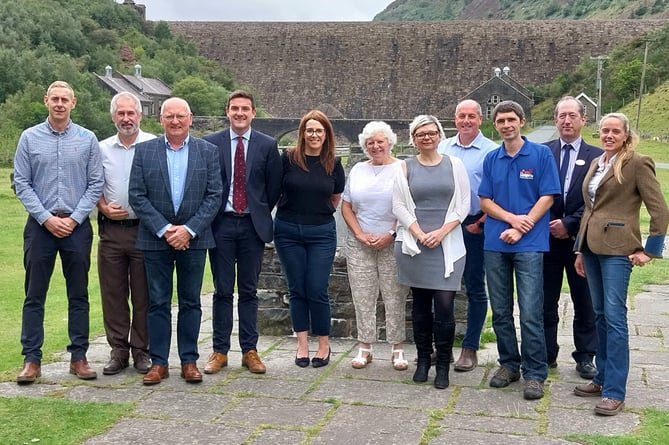 Brecon and Radnor MS James Evans and MP Fay Jones with MWT Cymru chairman Rowland Rees-Evans, chief executive Val Hawkins, operations manager Zoe Hawkins, Mid Wales Tourism Forum chairman Steve Hughson and MWT Cymru members Rhys Thomas, Mike Booth, Ryan Thomas, Greg Loweth and Helen Howarth.