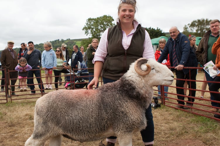 Lizzy Thomas Wilcock with her winning Herdwick Ram