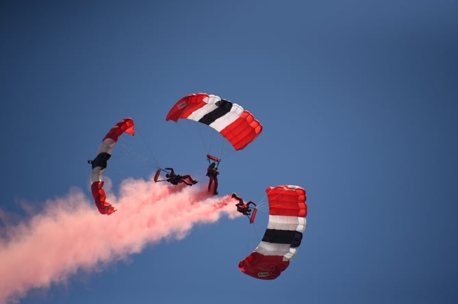 A plane circulated the show ground until it had reached high enough for the Red Devils Team to jump and parachute down.