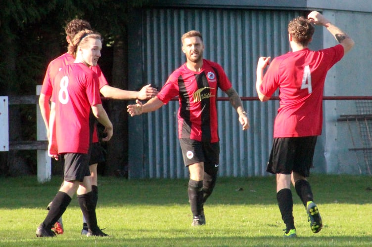 Presteigne St Andrews celebrate after Ruben Lloyd nets their third goal