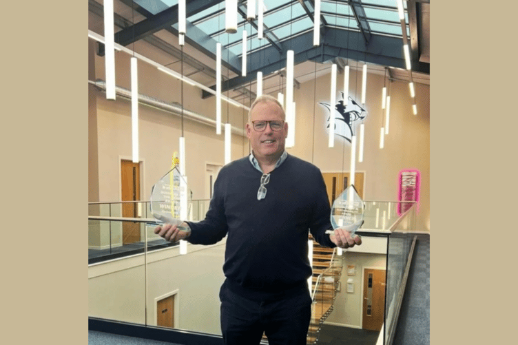 Radnor Hills founder William Watkins with the two Powys Business Awards