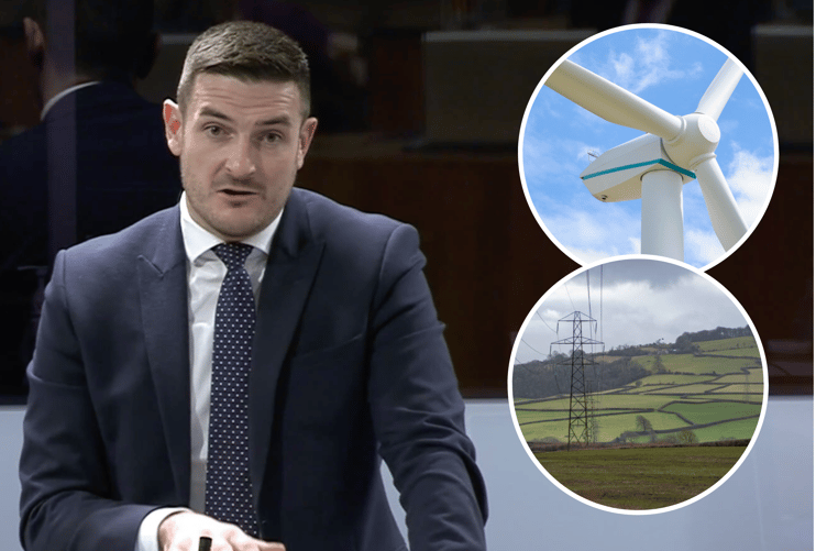 James Evans MS with wind turbine and plyons